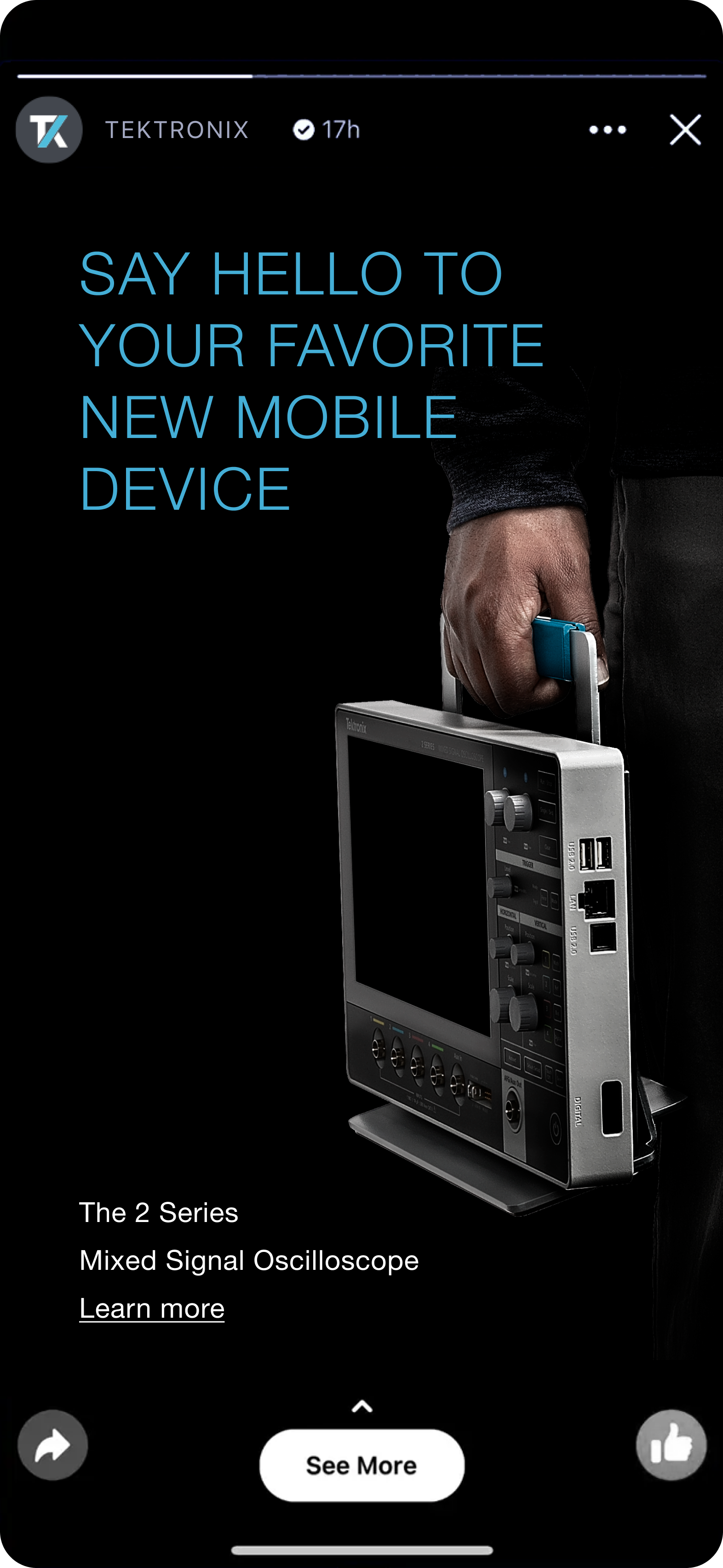 A person holding a sleek, portable mobile device with a flat screen and multiple ports, showcasing modern technology and design.